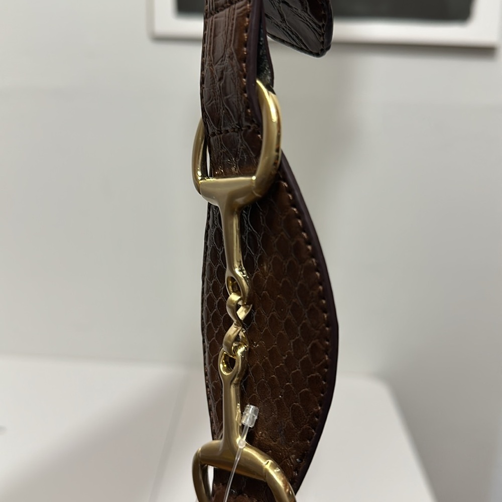 Brand New, dress belt.Synthetic Snake skin, 9 hole adjustments, Button closure